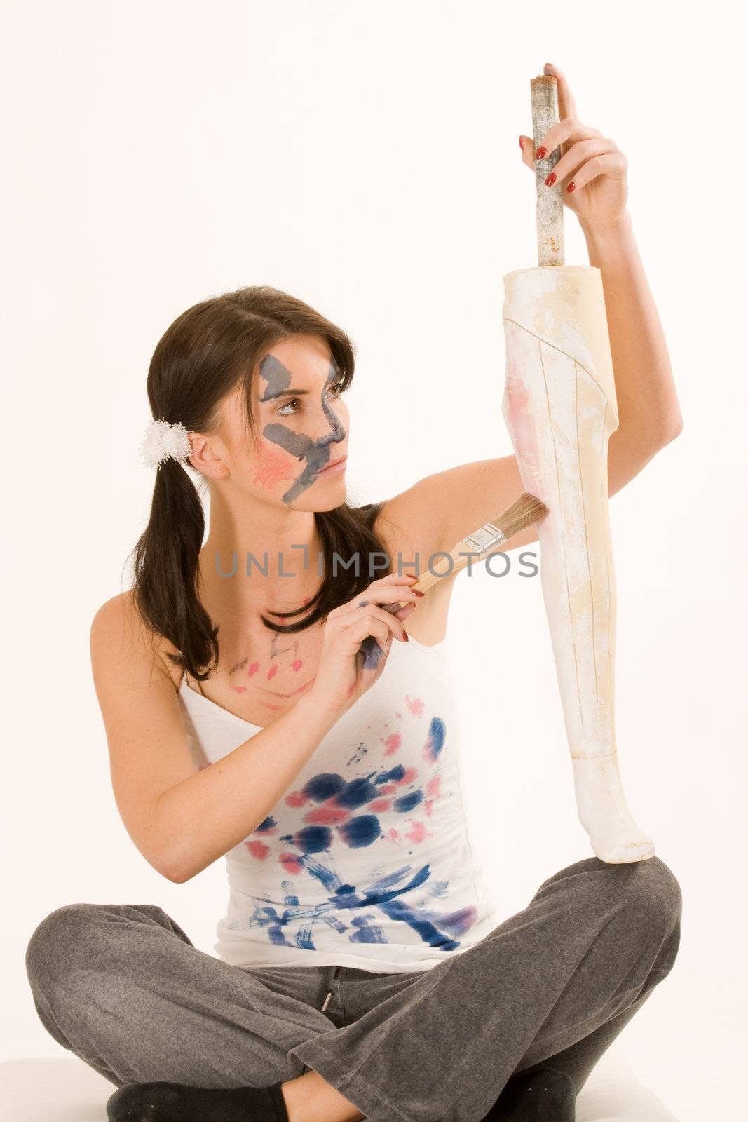 Young woman with paint on his face by STphotography