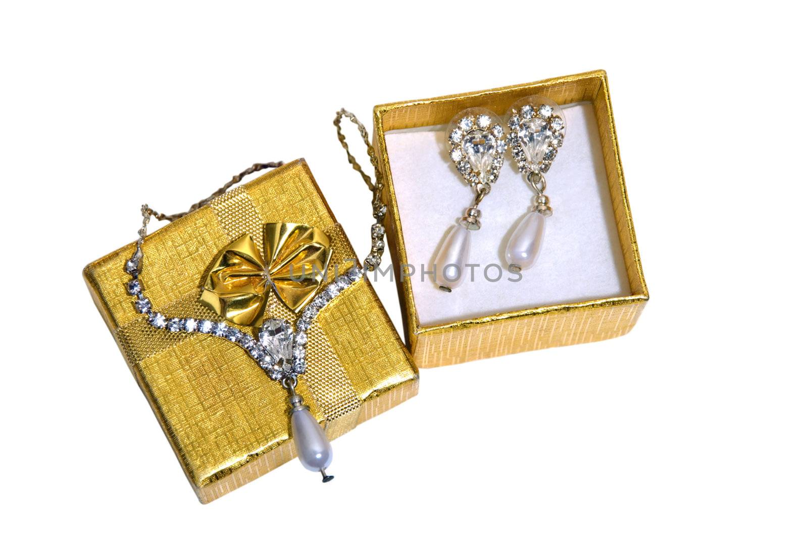 Gold jewelry sets in open boxes