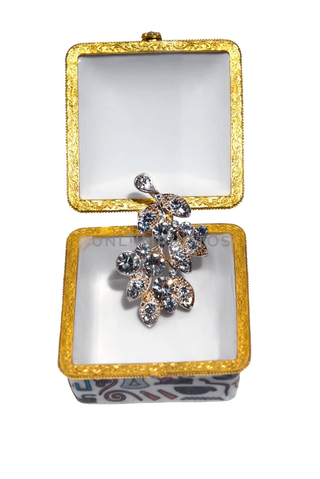 Gift box with necklace on isolated white background.