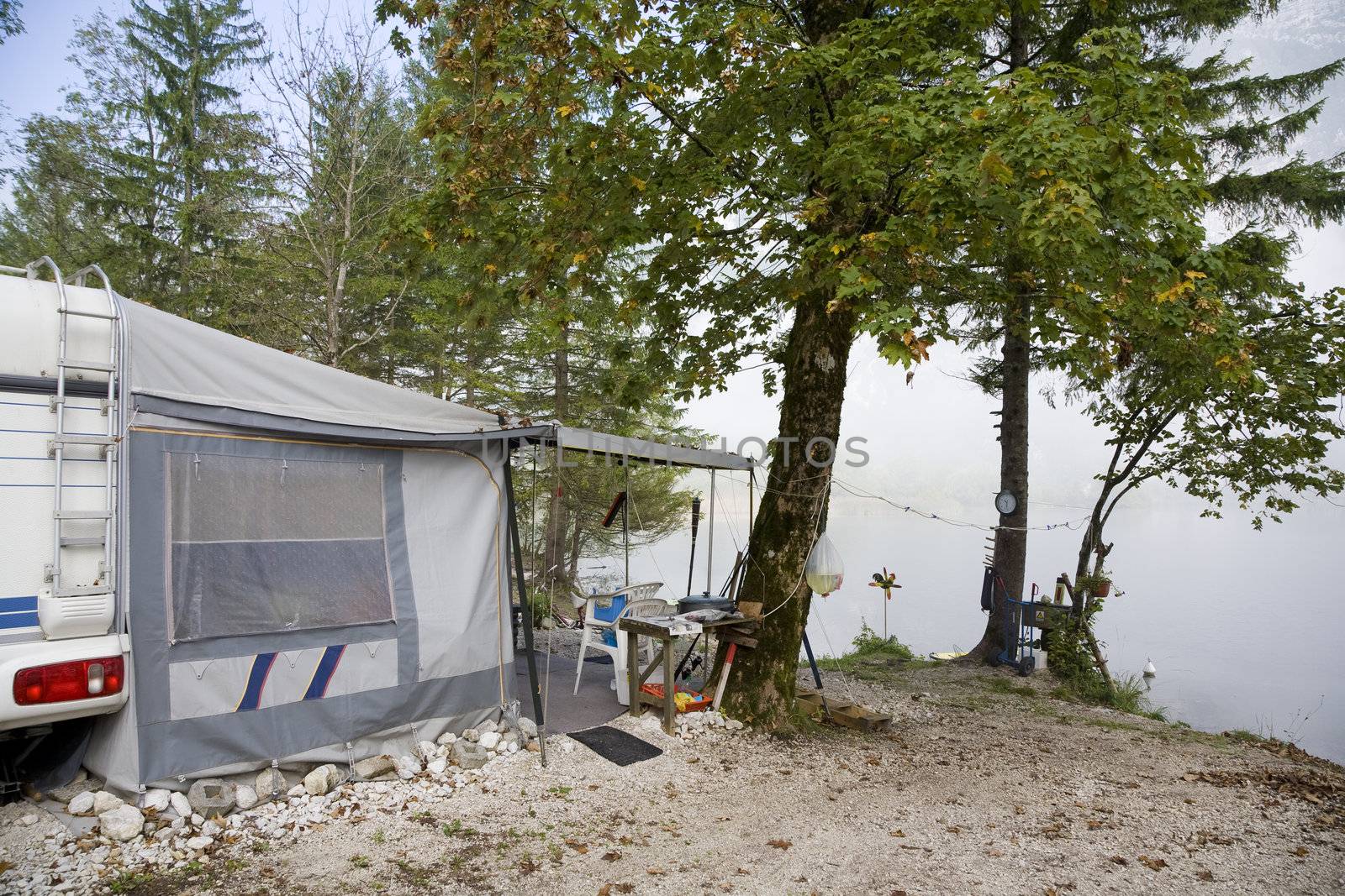 Campground foggy morning by Lake Bohinj, Slovenia.