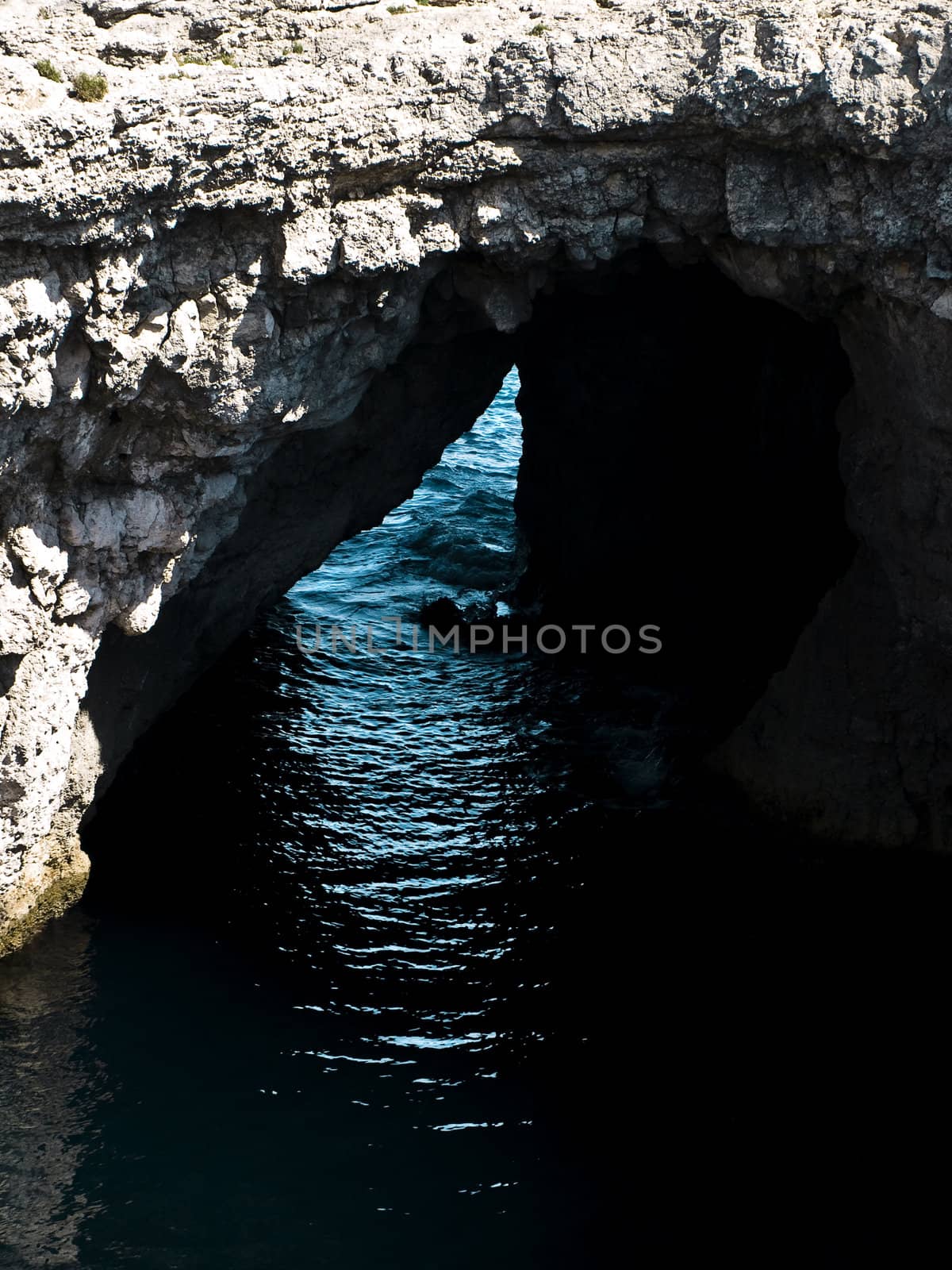 One of the many caves around the coast in Malta