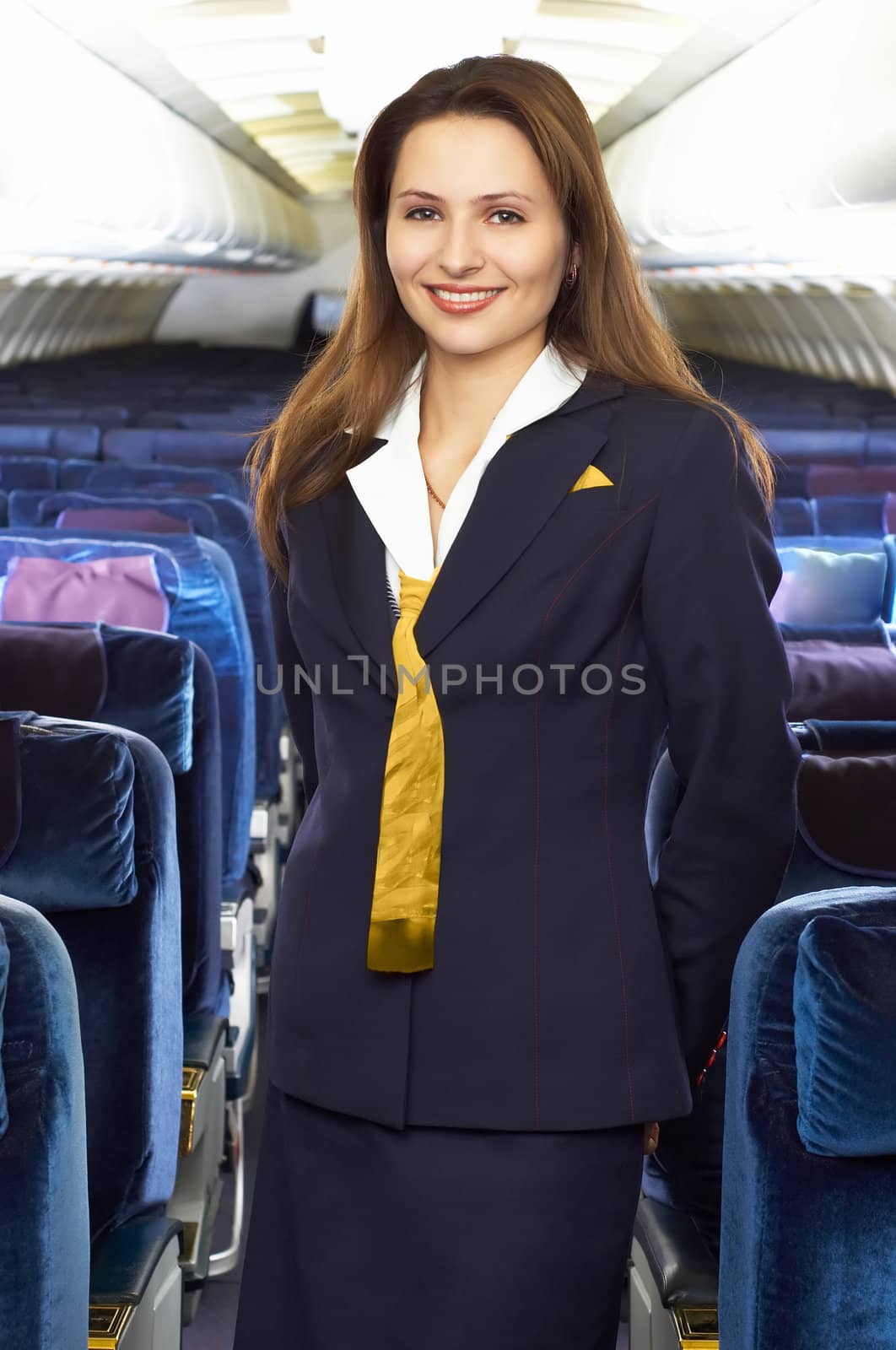 air hostess in the empty jet airliner cabin