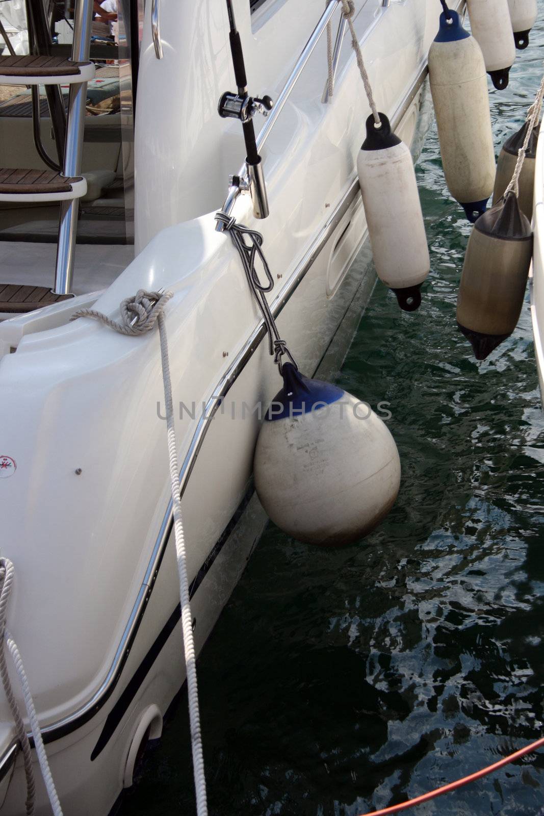 buoys on boat by keki