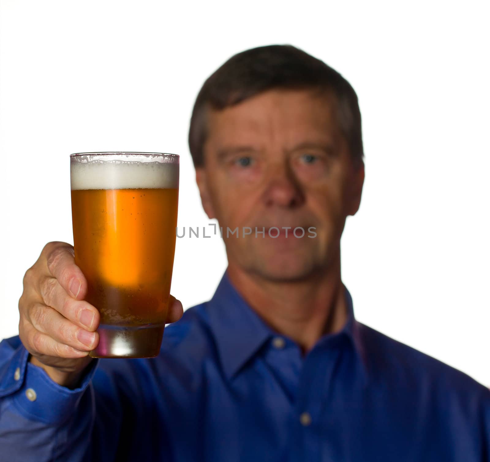 Senior man with glass of beer by steheap