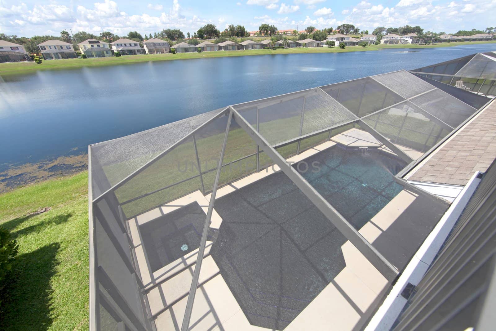 A Swimming Pool and Spa overlooking a Lake