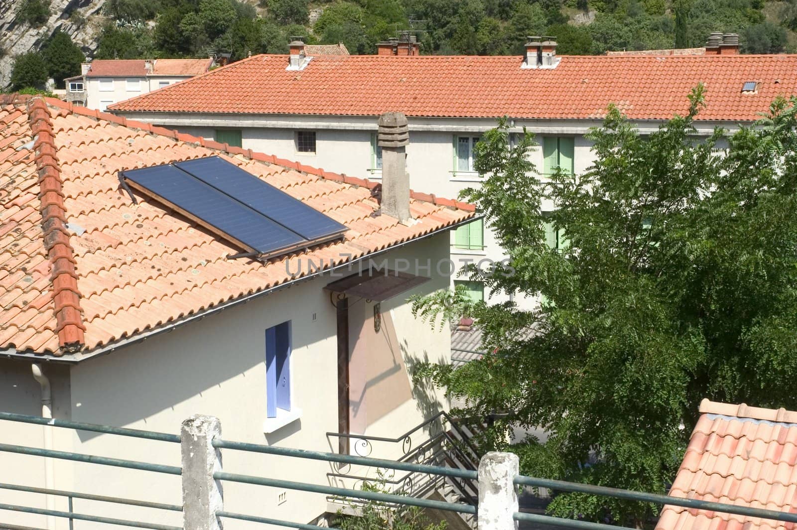 Heat solar water installed on a roof of Anduze, French city in the south-east of France.