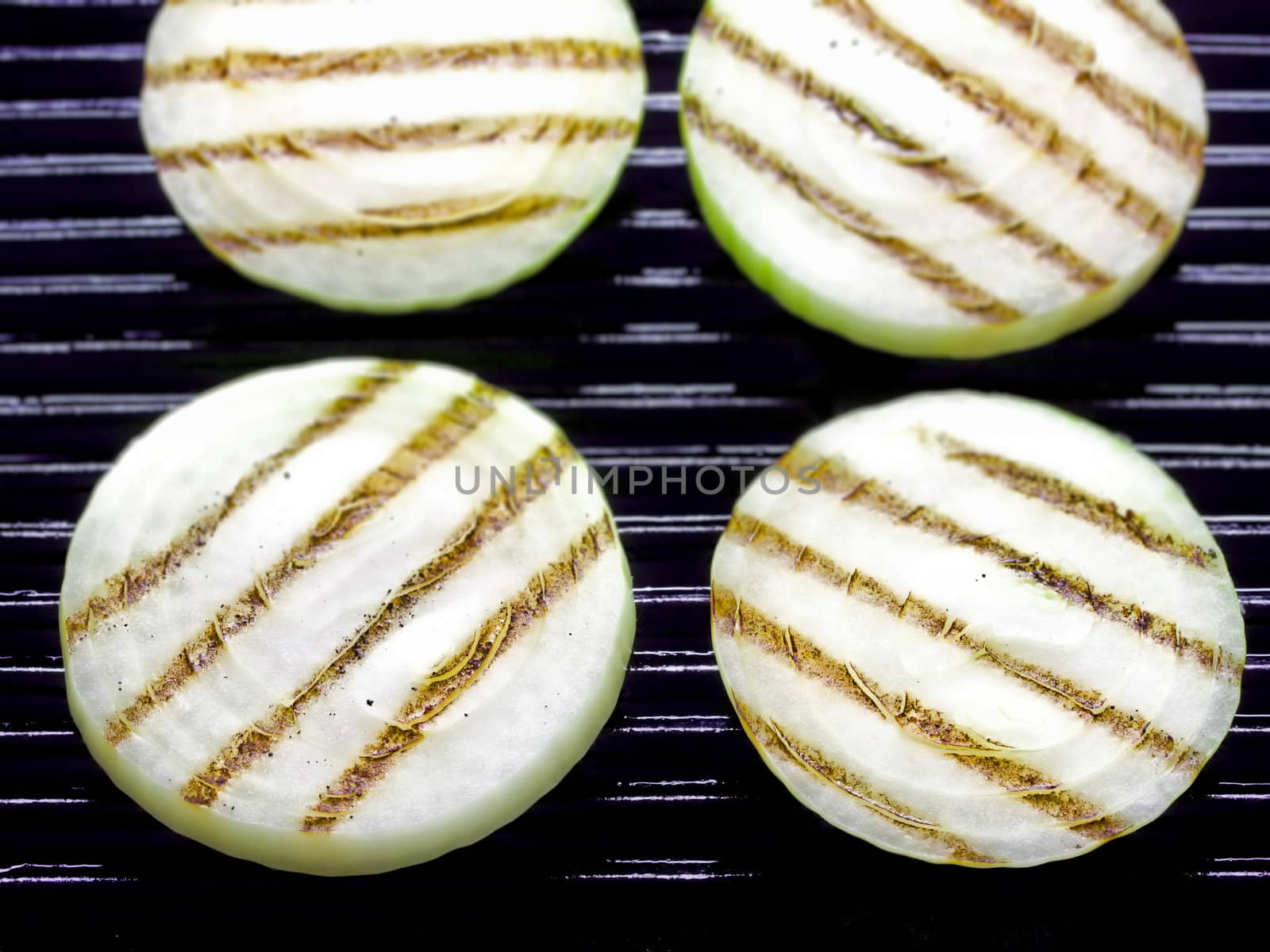 close up of grilled onion slices