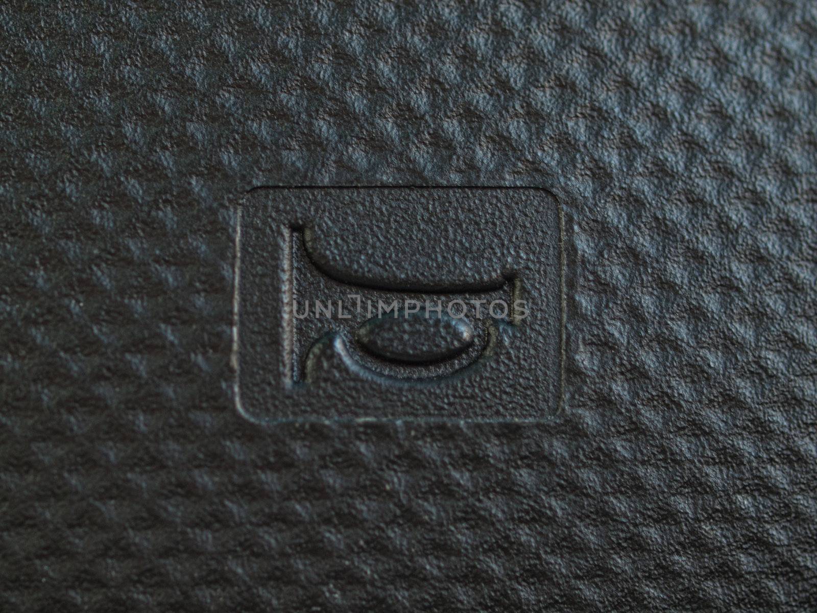macro of a horn symbol  inside a car