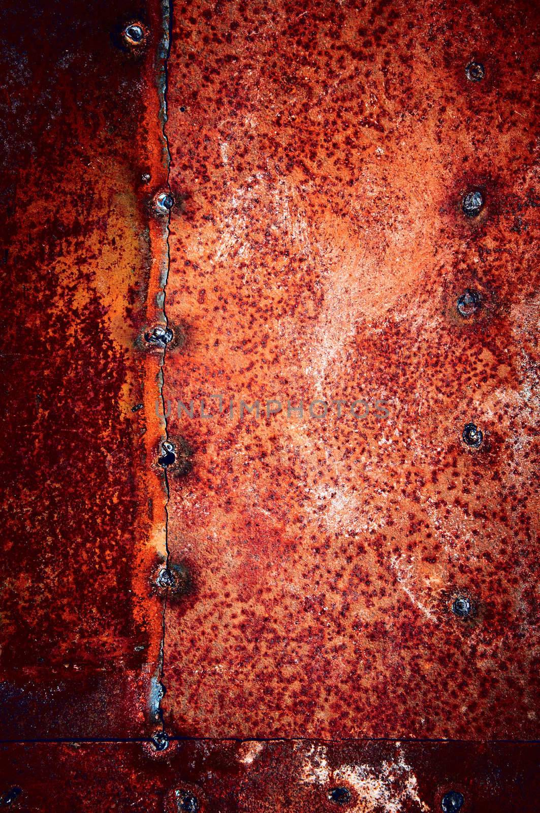 Red color of a rust with welding inclusion