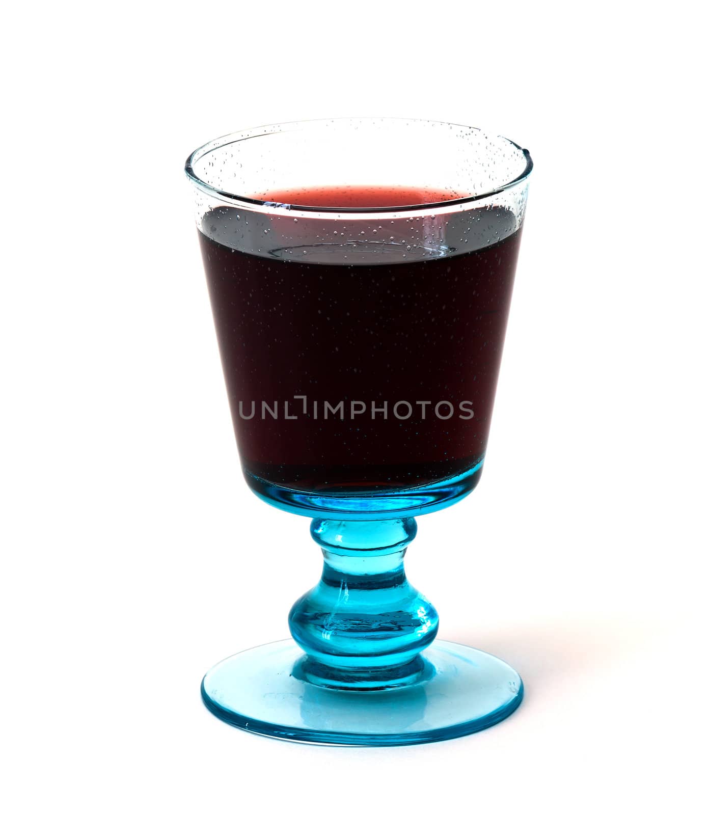 blue glass of red wine on a white background