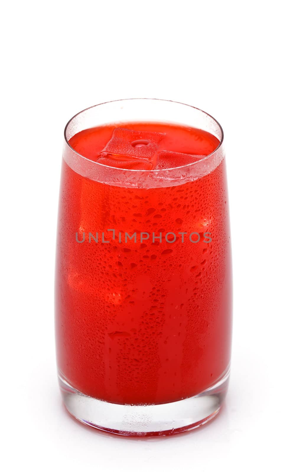 glass of red orange juice with ice by Discovod