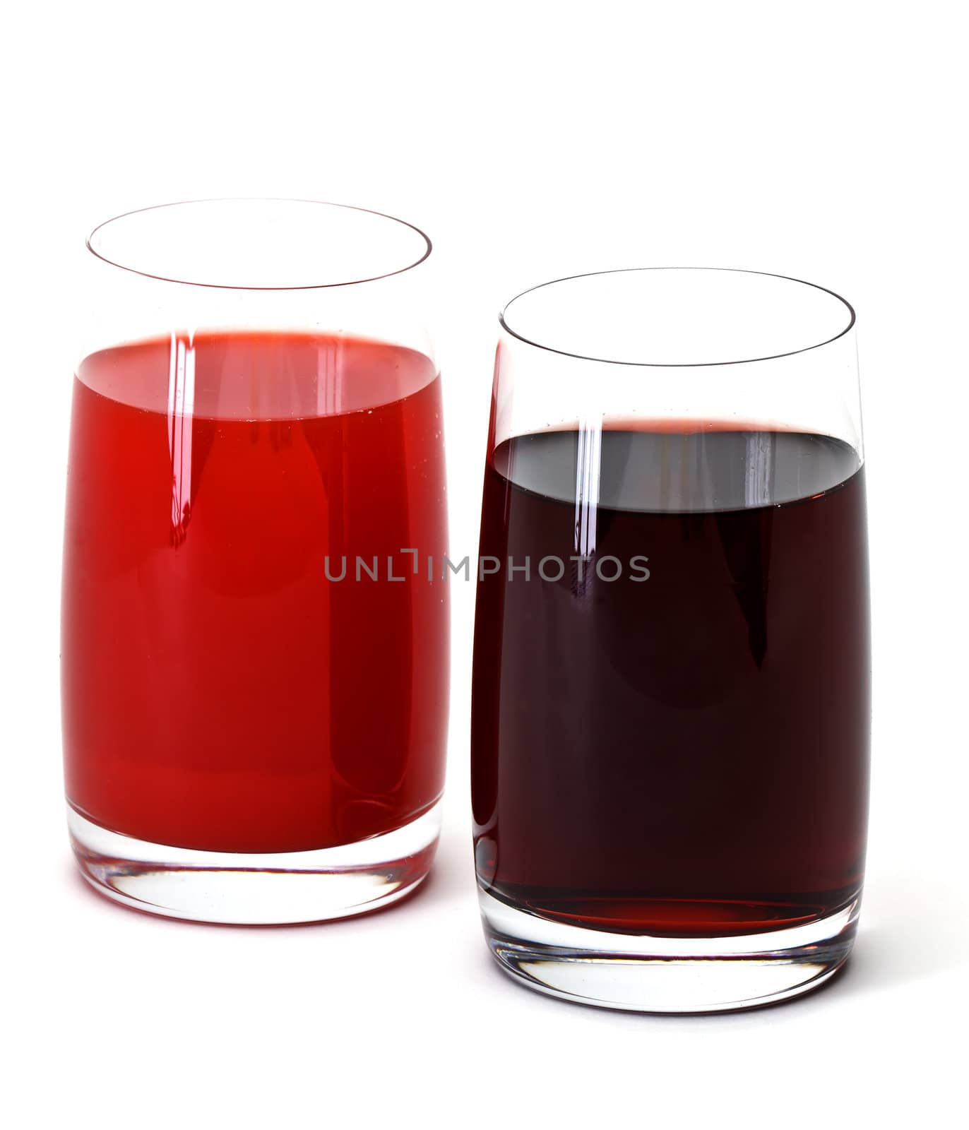 two glass of  juice by Discovod