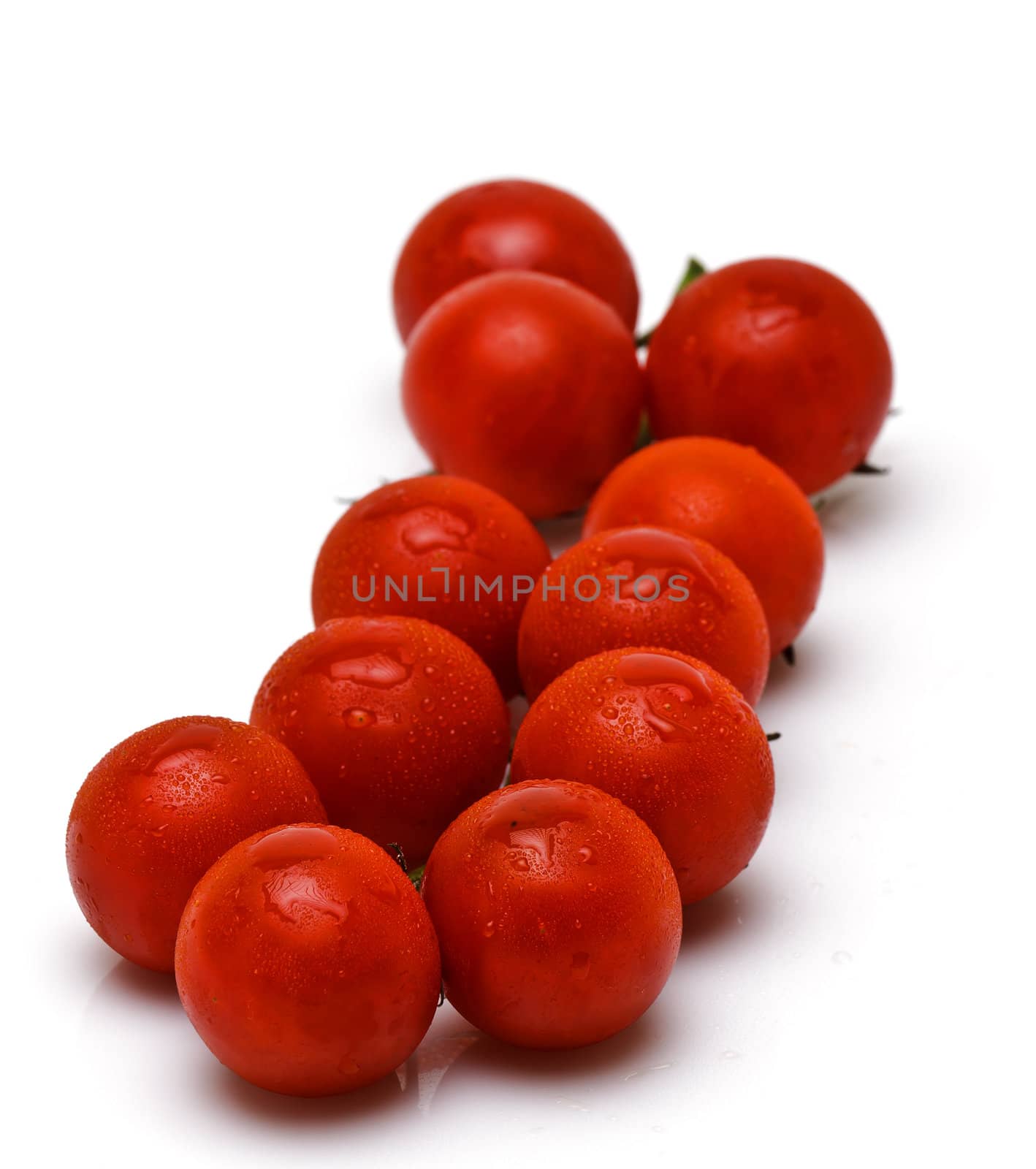 Cherry tomatoes on white background