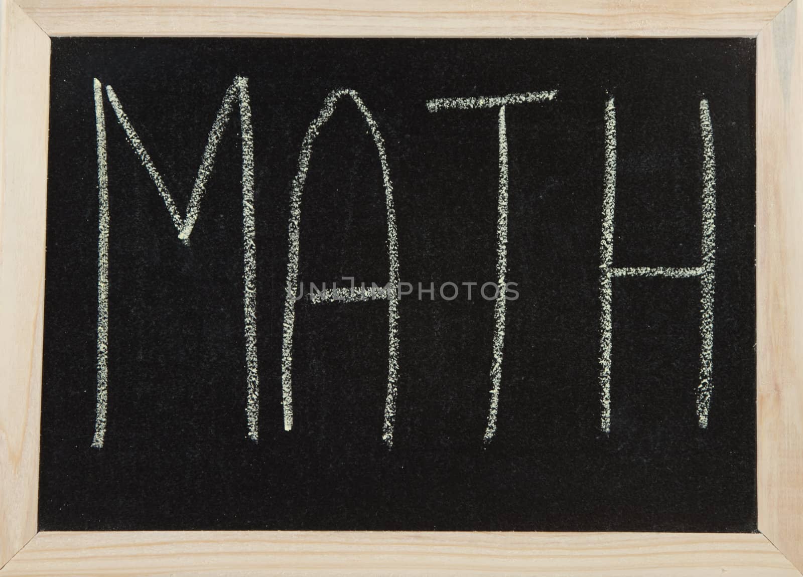 A black board with a wooden frame and the word 'MATH' written in chalk.