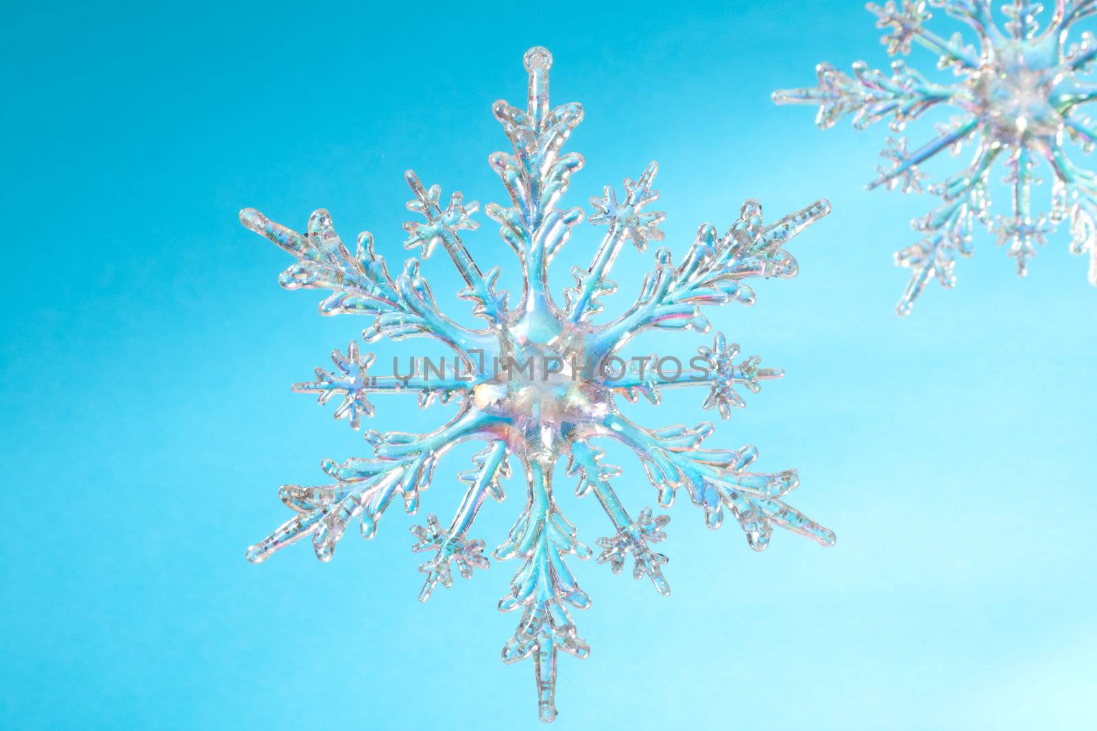 Snowflake shape, photo on the blue background