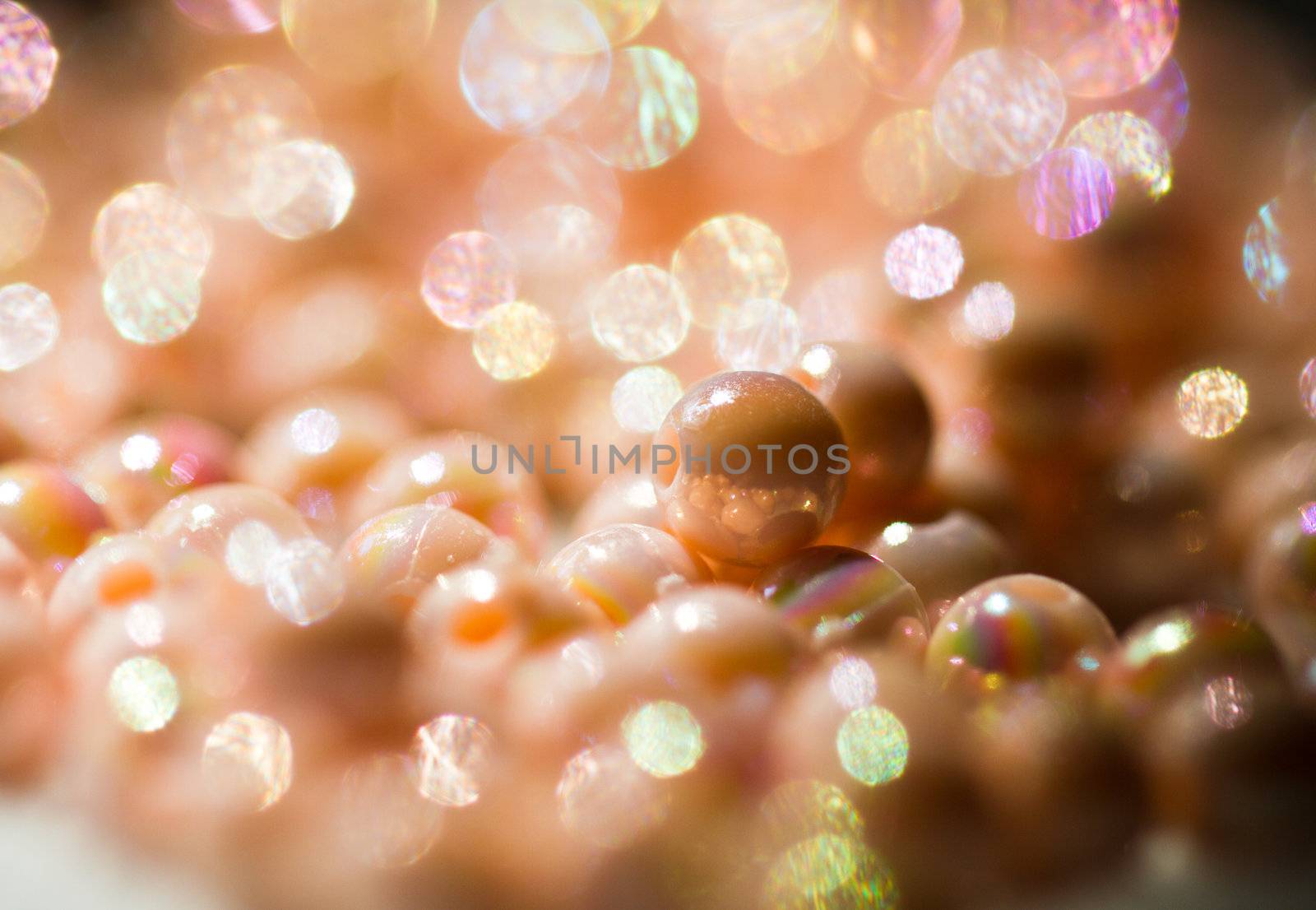 beige colored beads shine under sunlight with bright and dark area