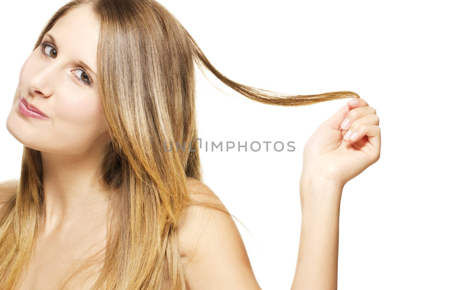 beautiful cheeky woman playing with her hair on white background