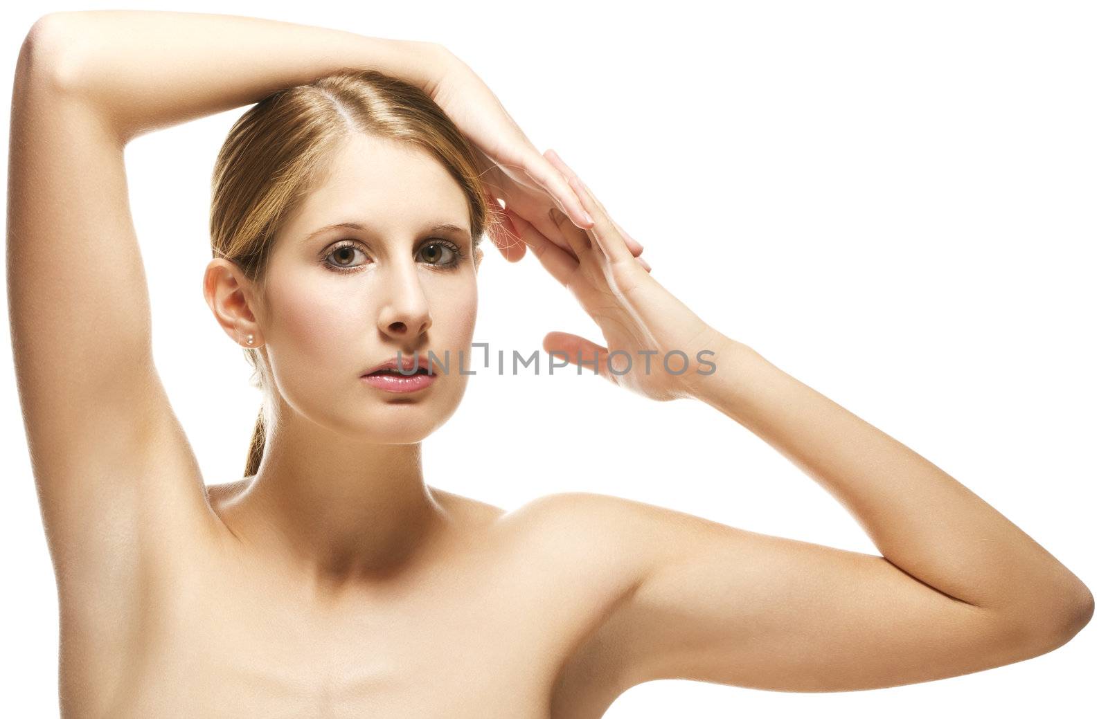 beautiful woman holding arms over her head on white background