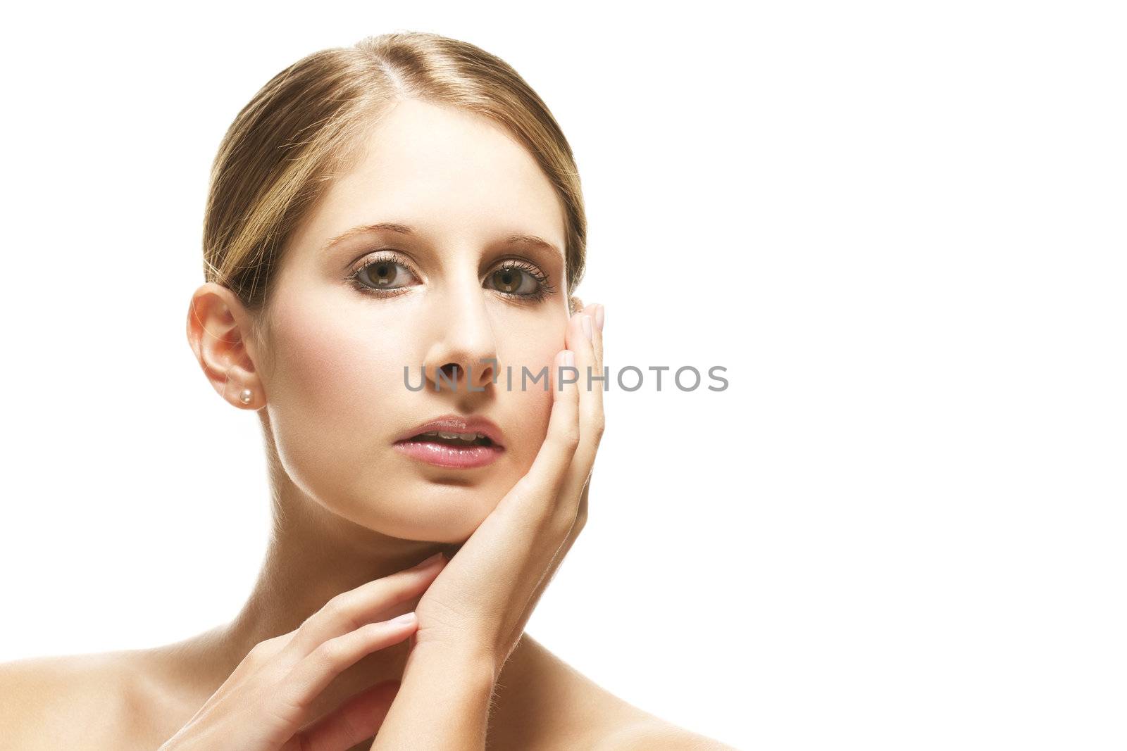 beautiful woman holding hands in her face on white background