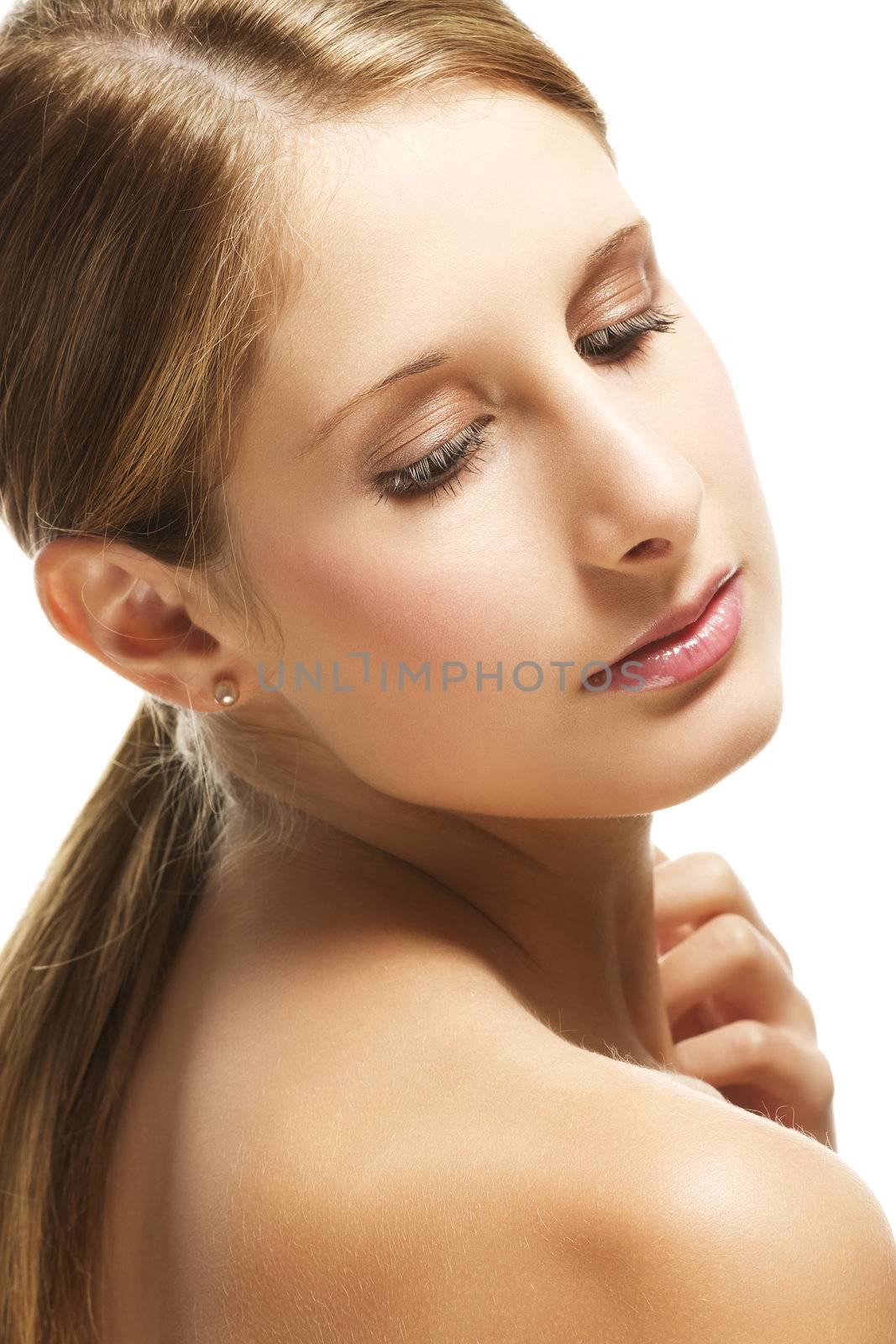 beautiful woman looking to her shoulder on white background