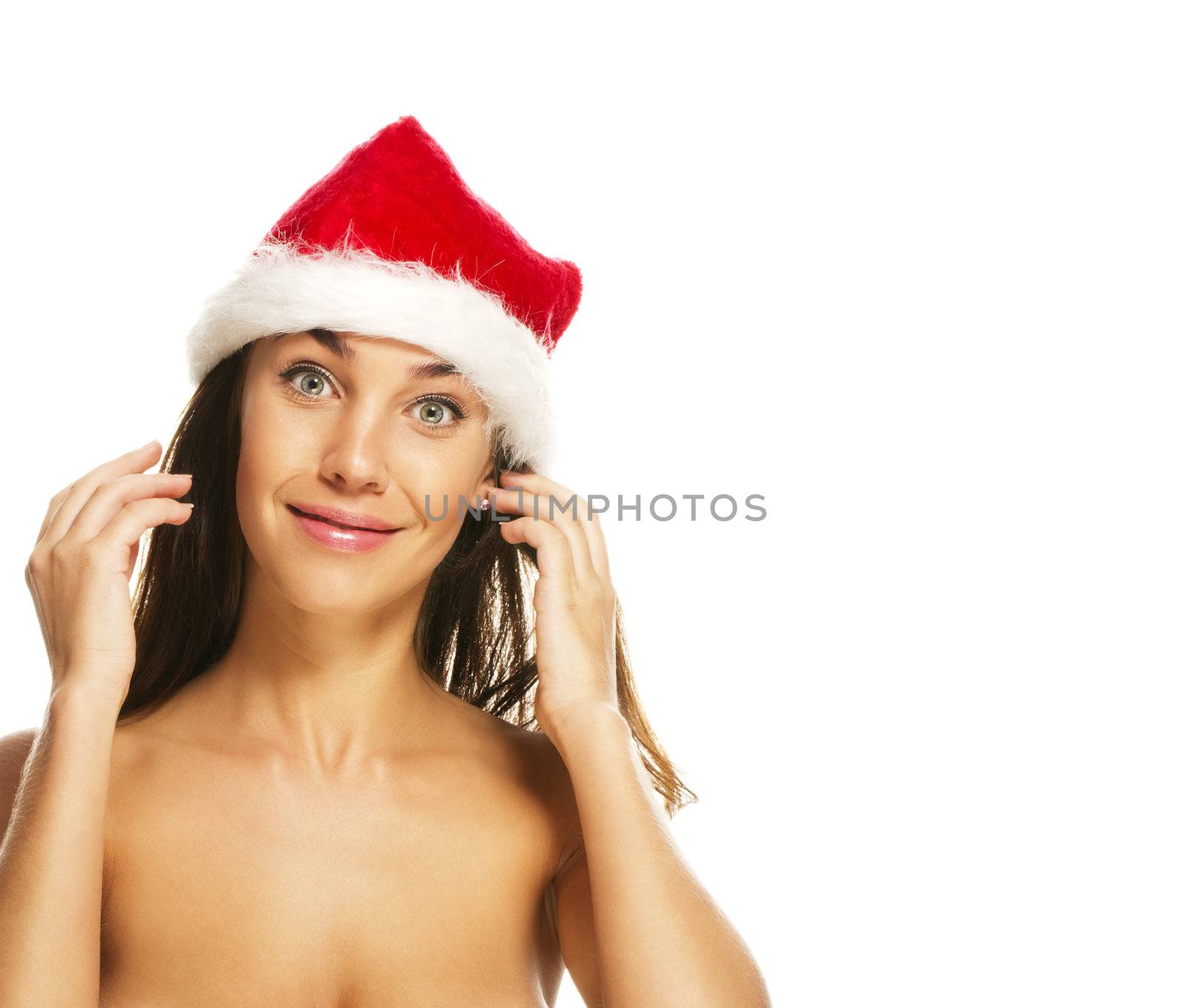 young woman wearing santas hat making funny face on white background