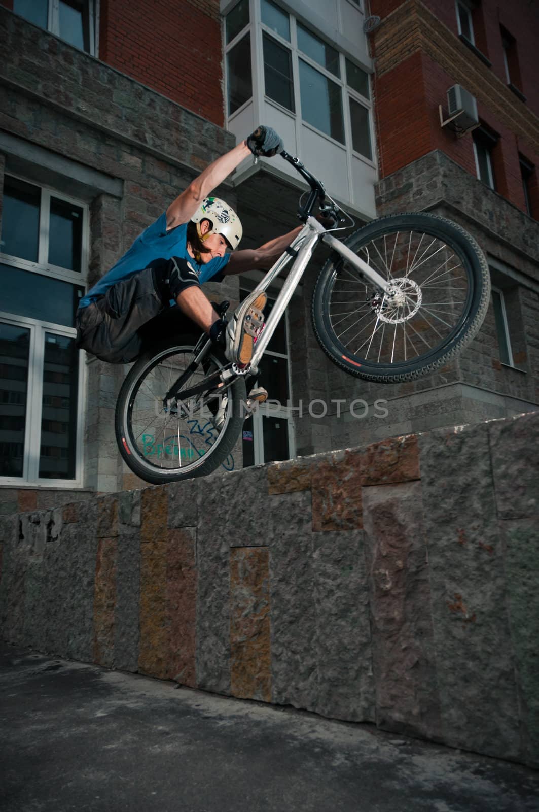 Biker standing on border by dmitryelagin