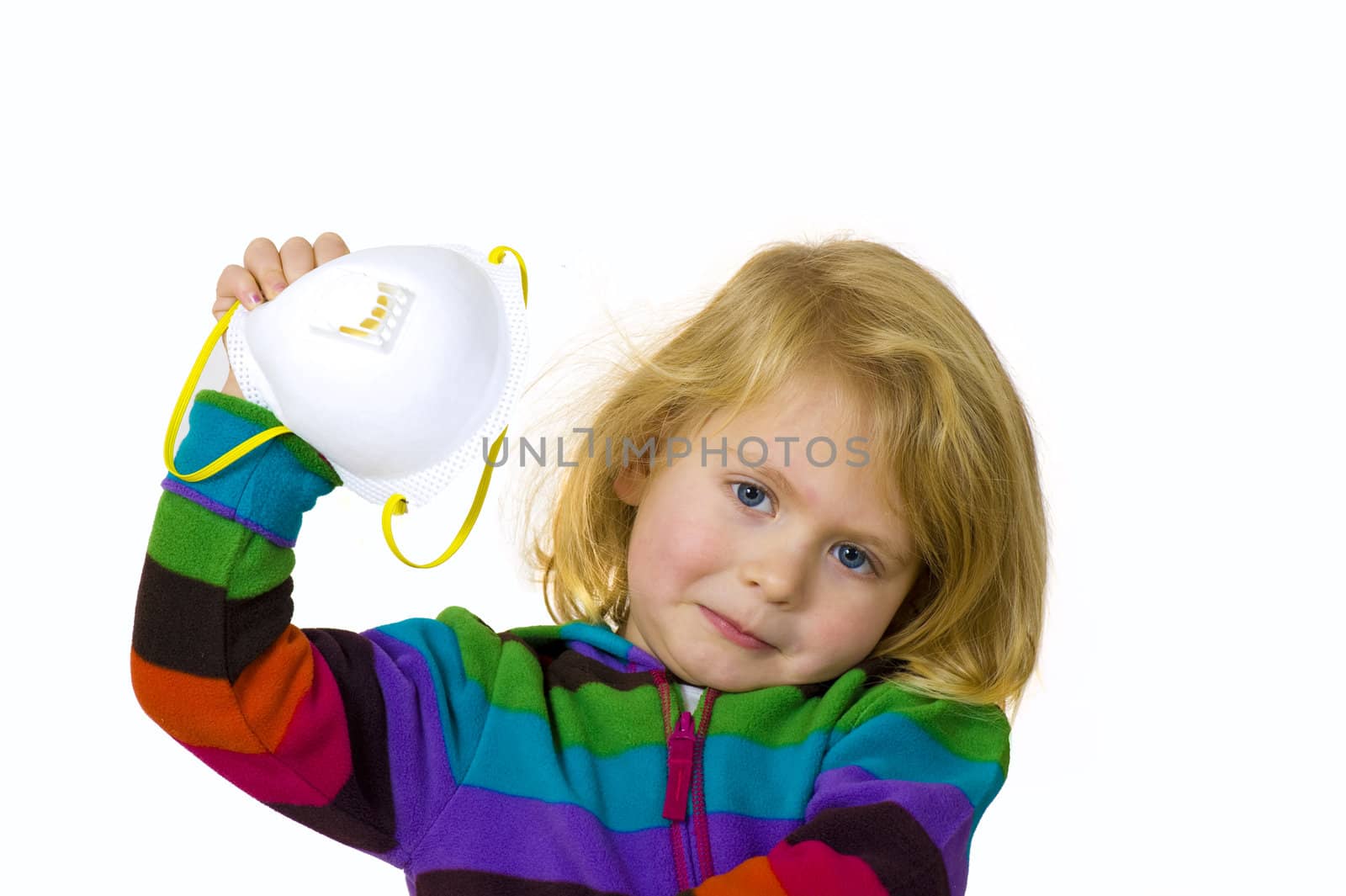 A girl holding up a N95 flu mask