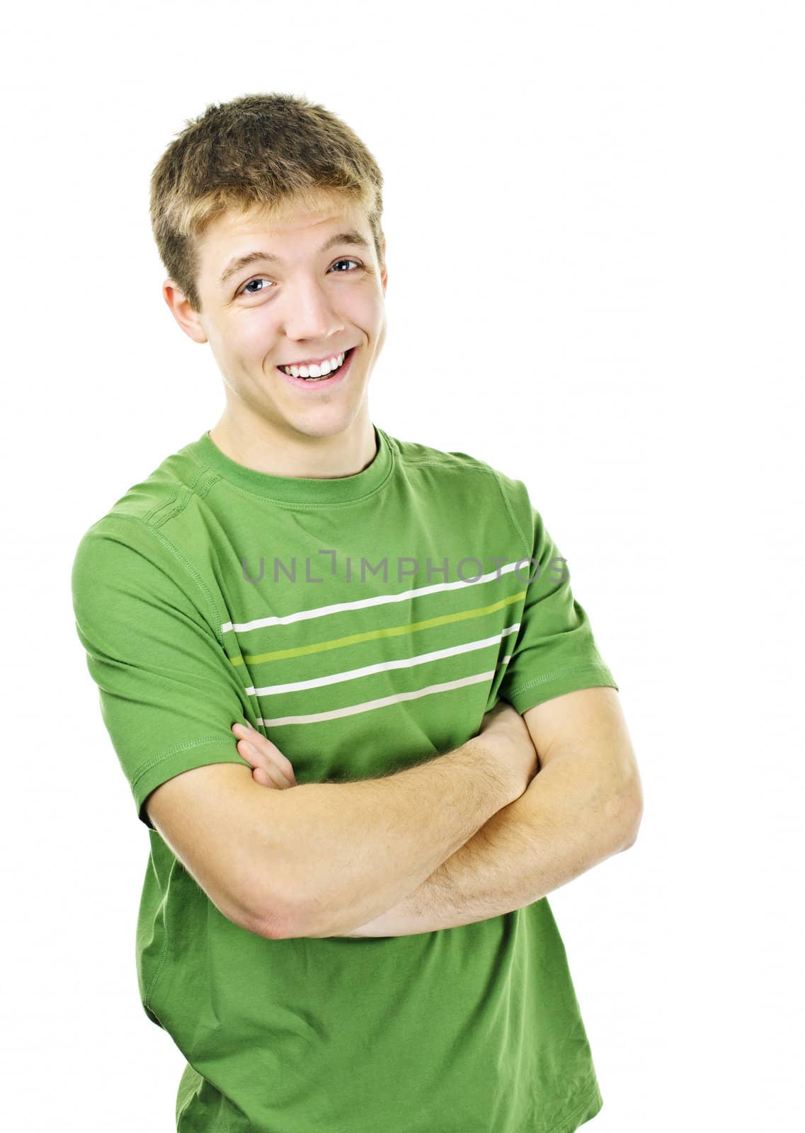 Happy young man standing with arms crossed isolated on white background