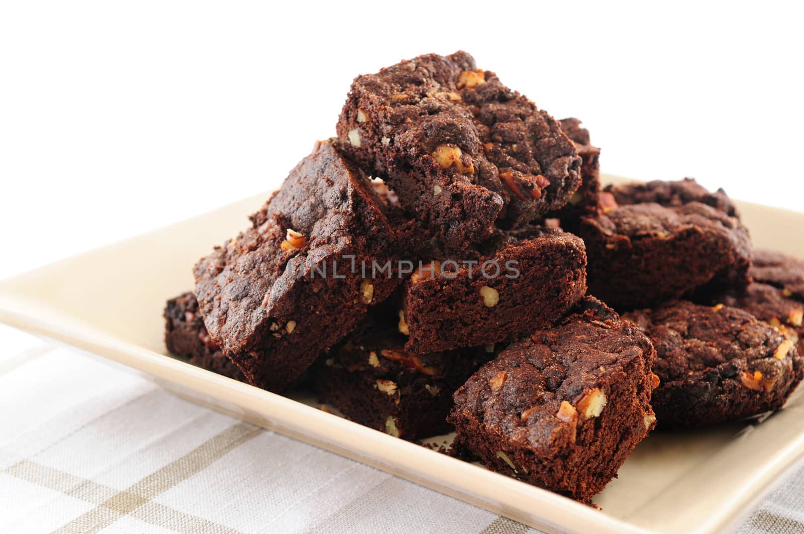 Homemade chocolate brownies served on a plate