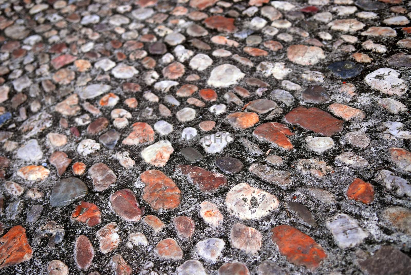 Abstract background of old medieval cobblestone pavement