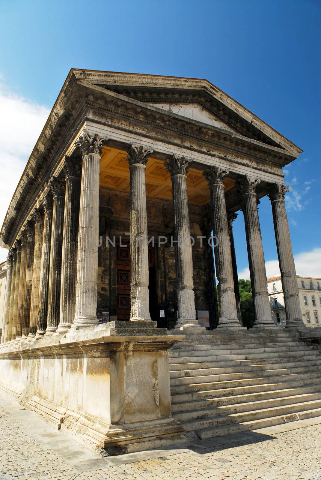 Roman temple Maison Carree in city of Nimes in southern France