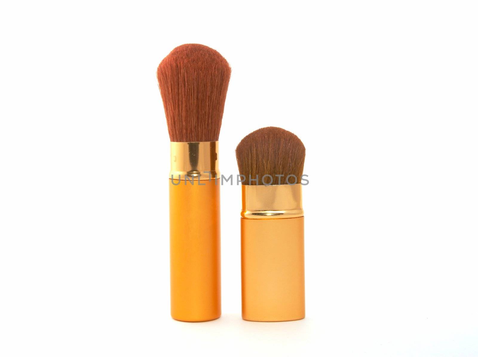 Soft cosmetic brush on a white background