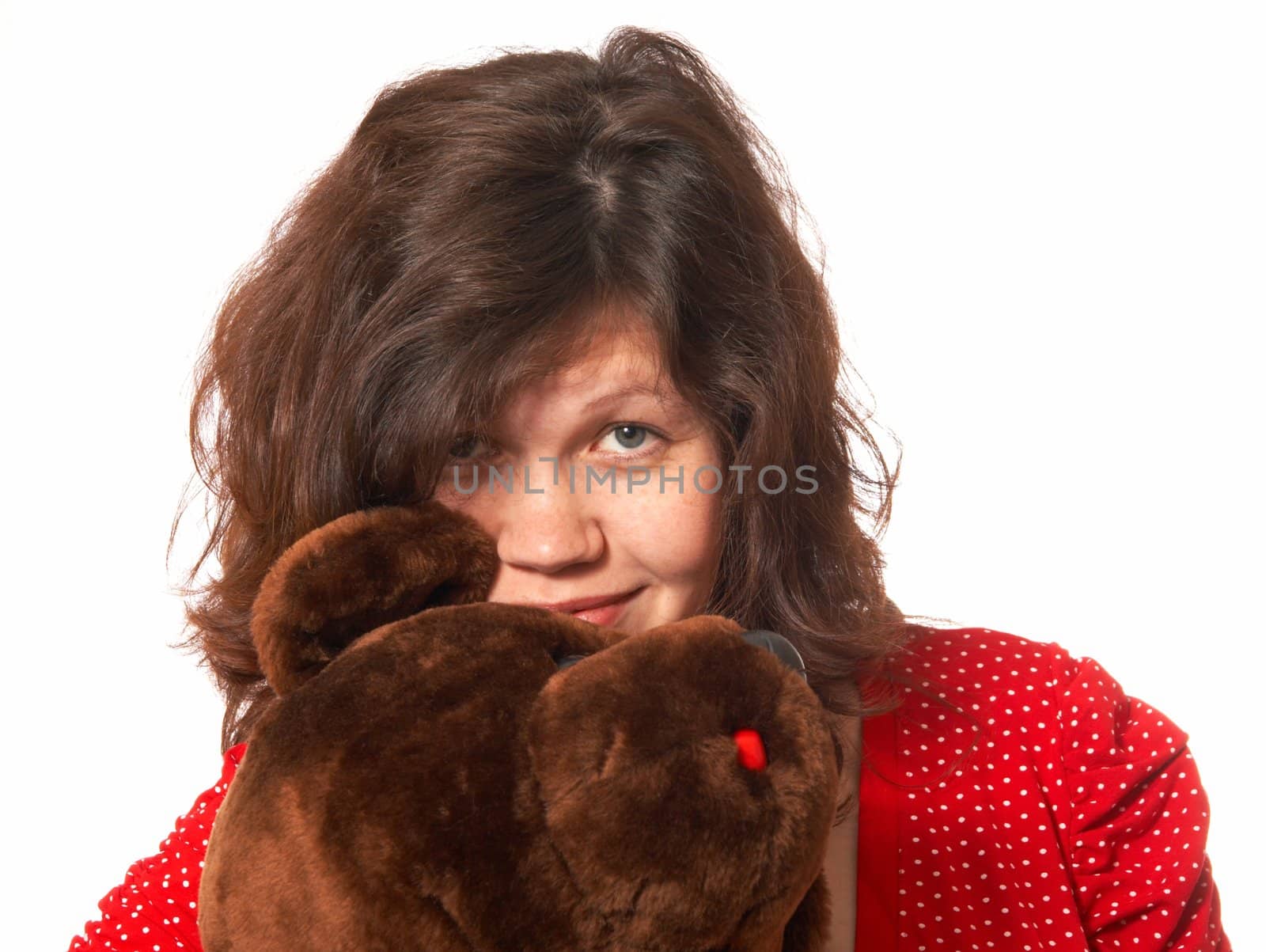 Portrait of the pregnant woman with the teddy bear