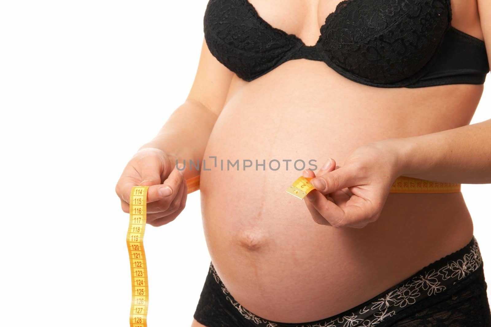 pregnant woman in black underwear