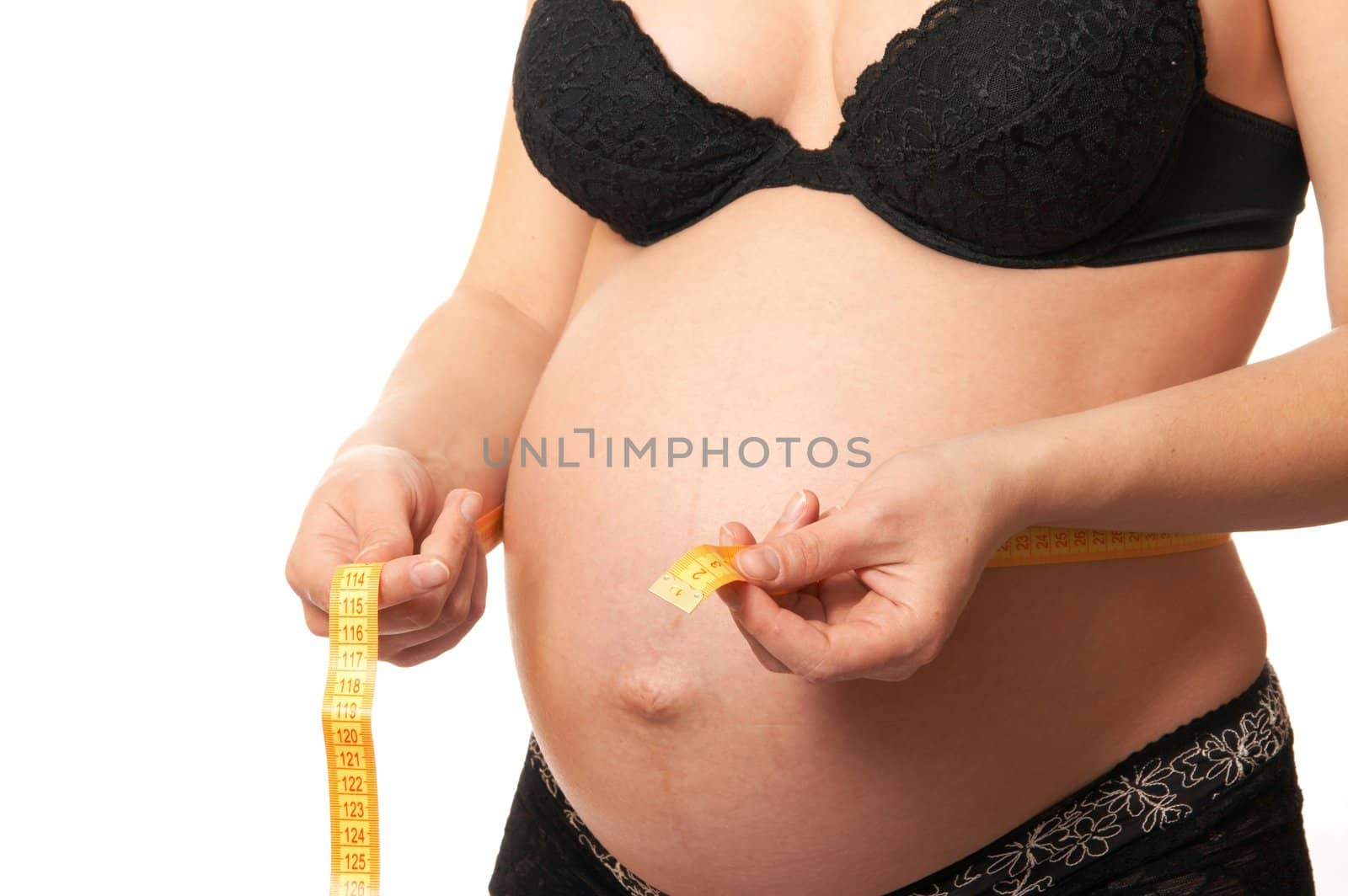 pregnant woman in black underwear