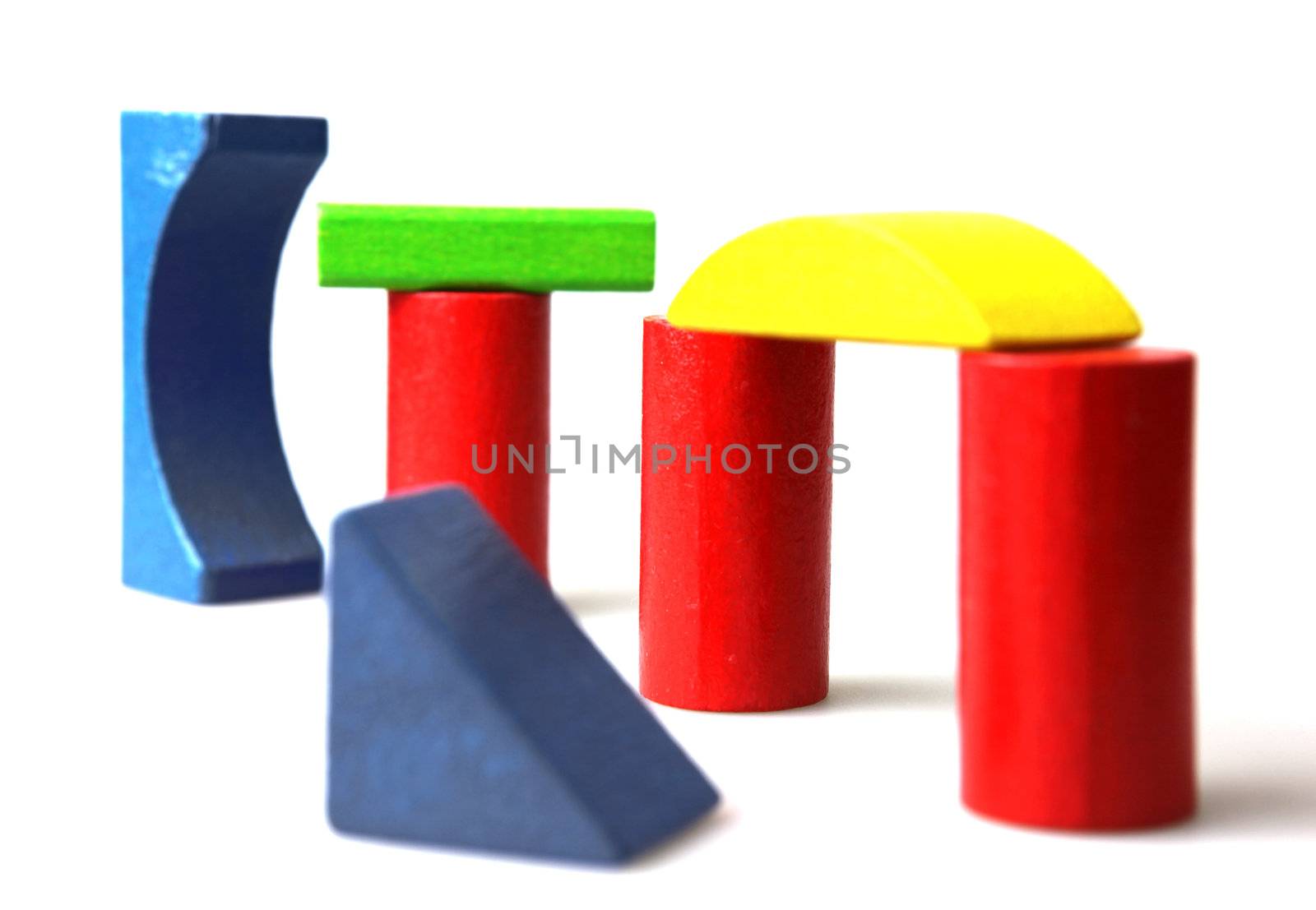 Wooden building blocks isolated on white background
