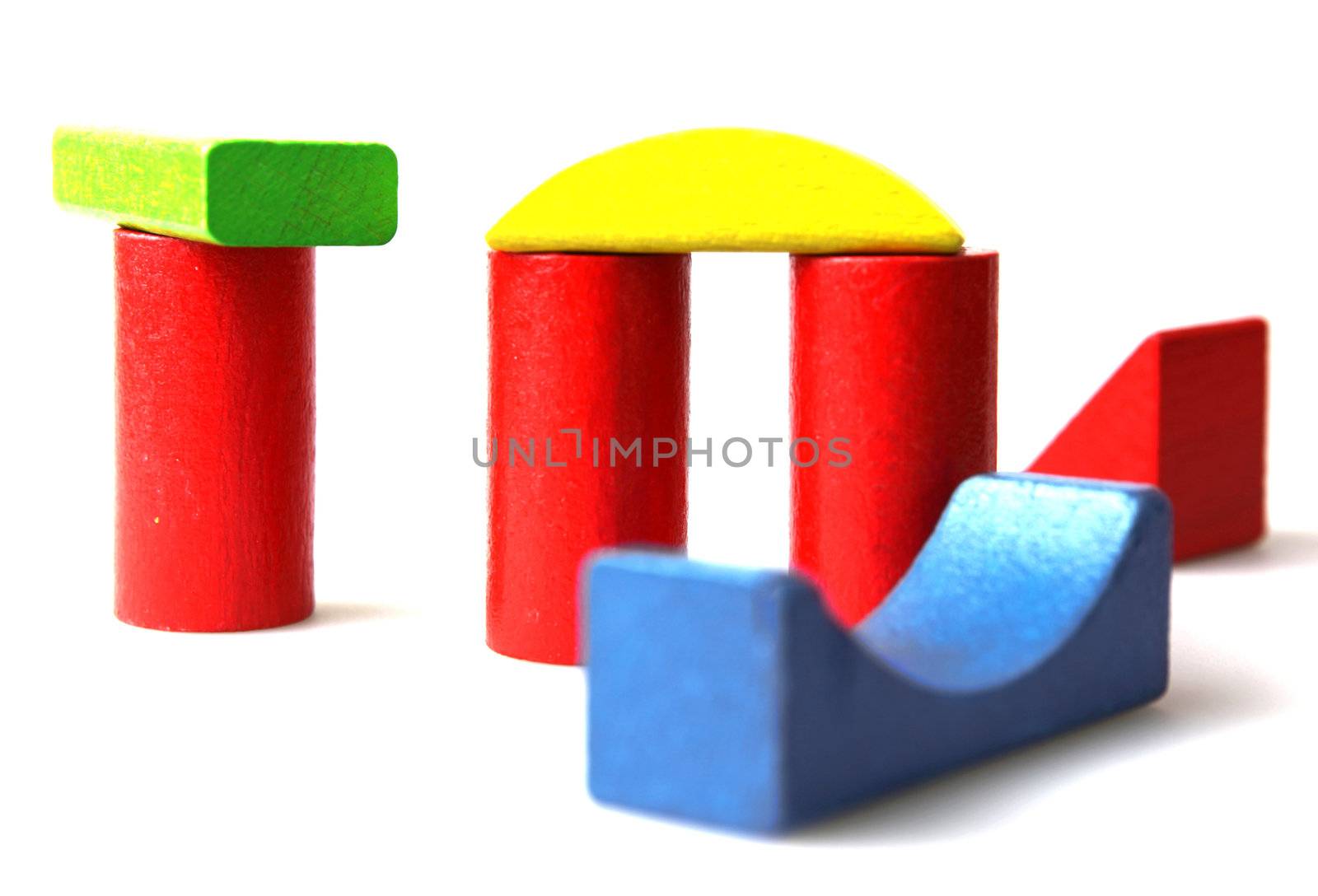 Wooden building blocks isolated on white background