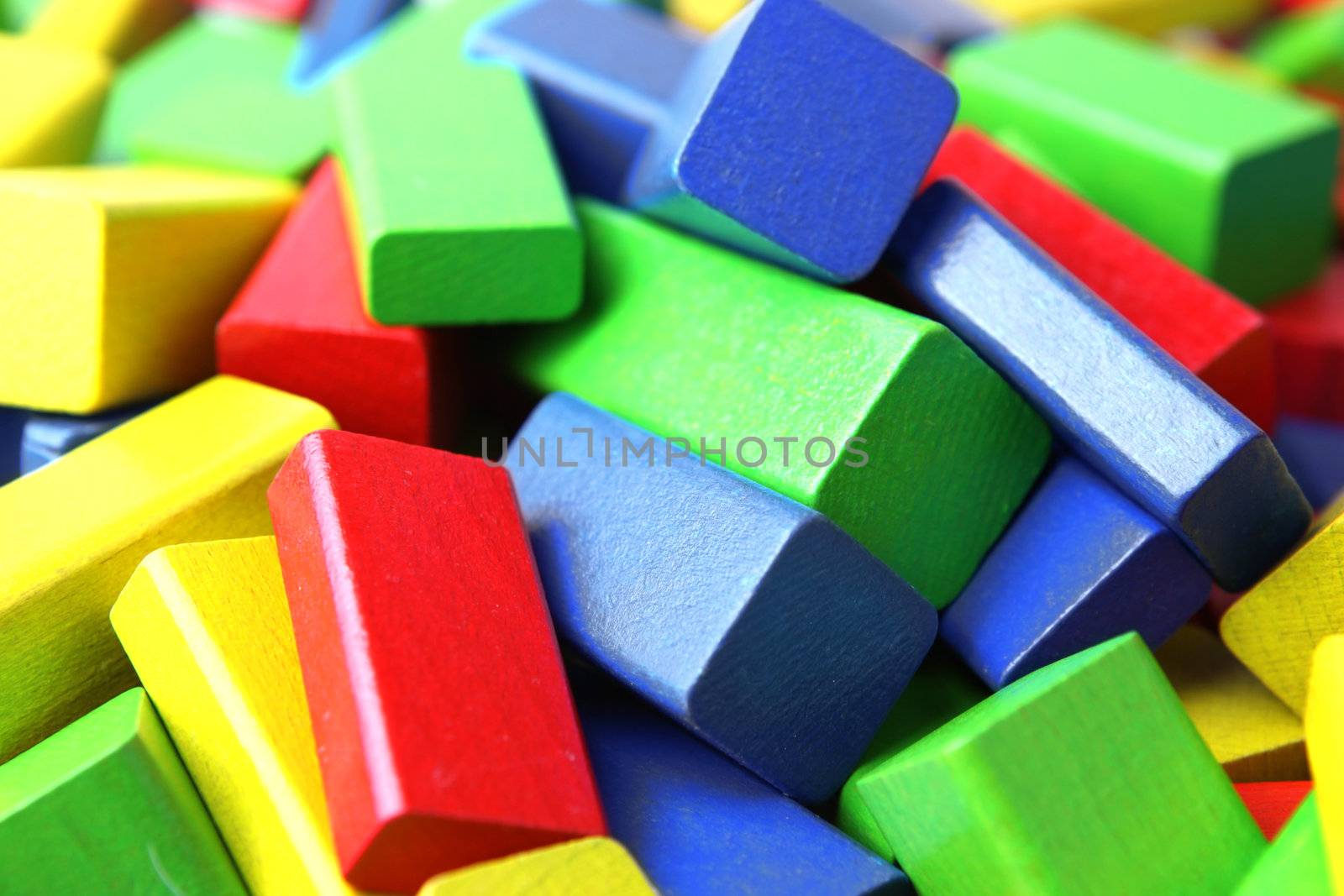 Wooden building blocks isolated on white background