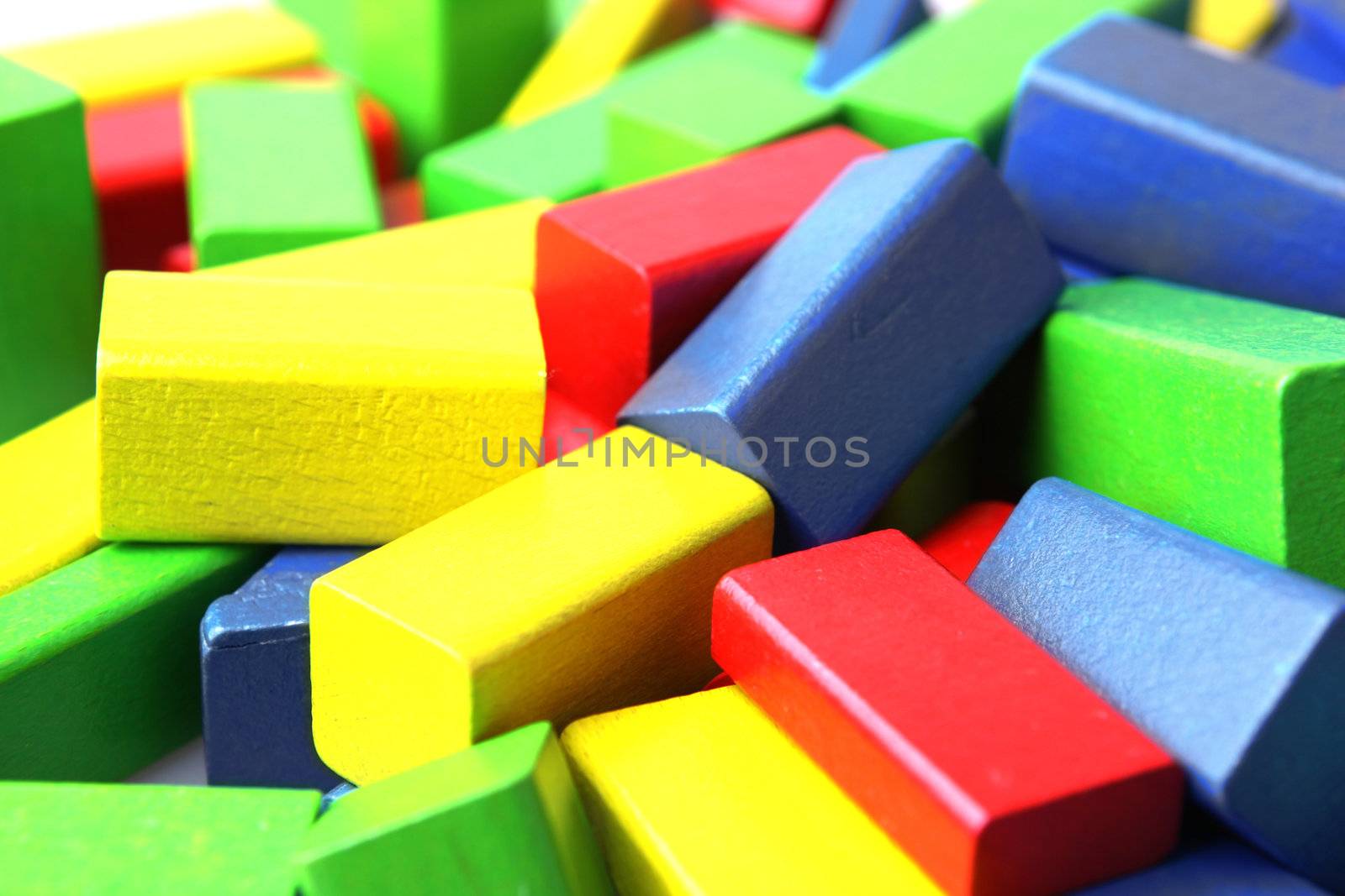 Wooden building blocks isolated on white background