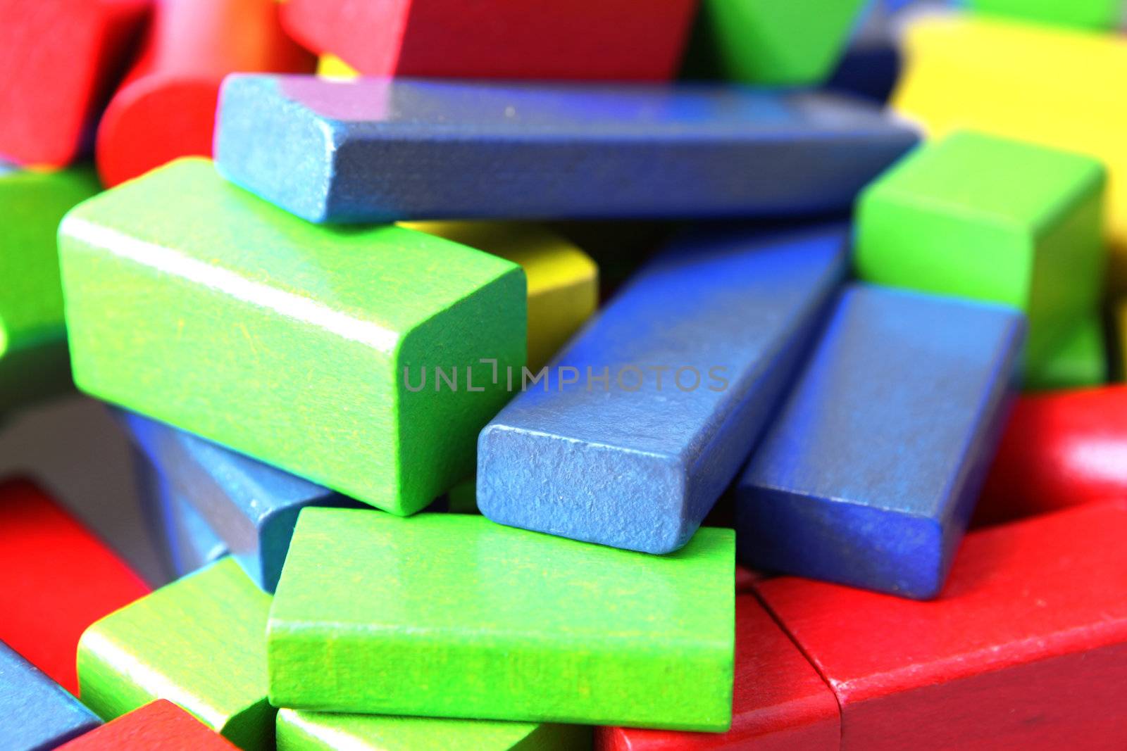 Wooden building blocks isolated on white background