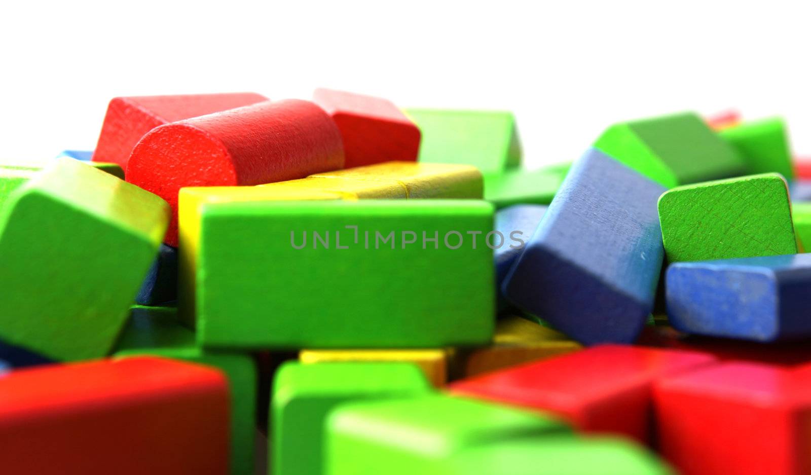 Wooden building blocks isolated on white background