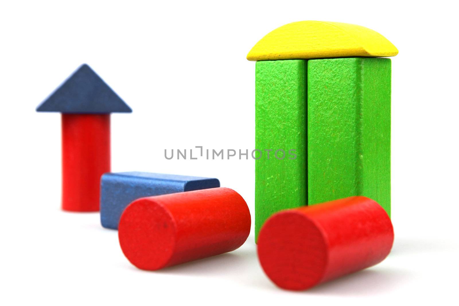 Wooden building blocks isolated on white background