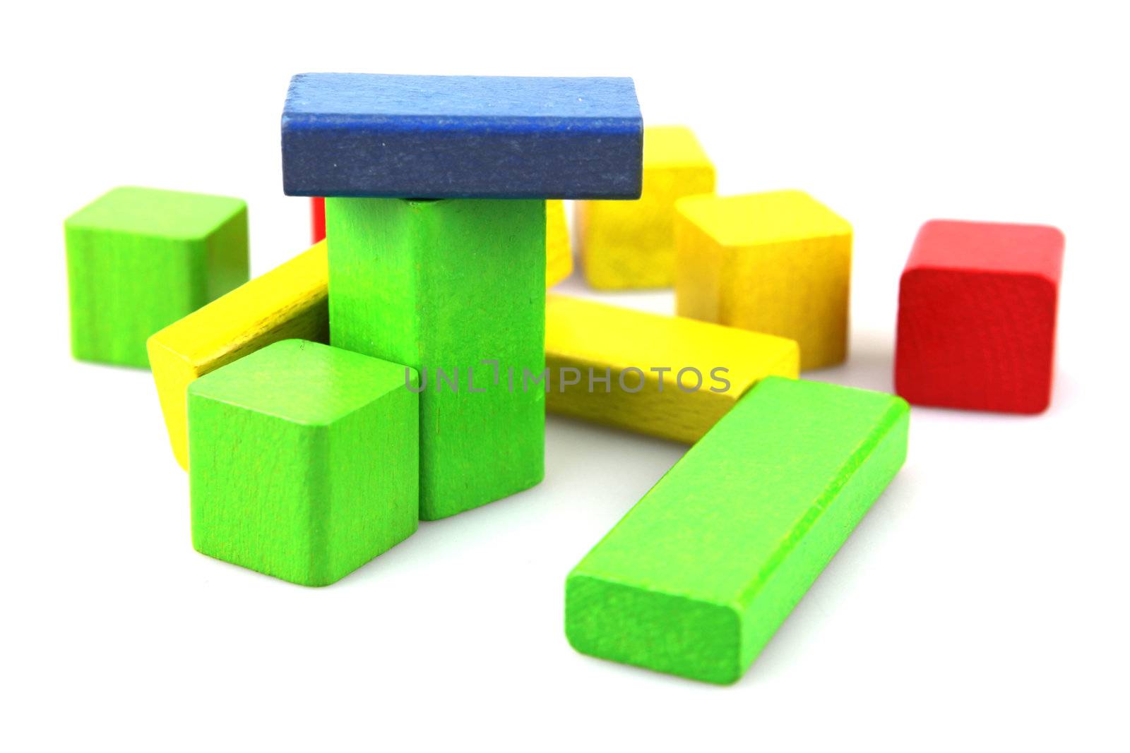 Wooden building blocks isolated on white background