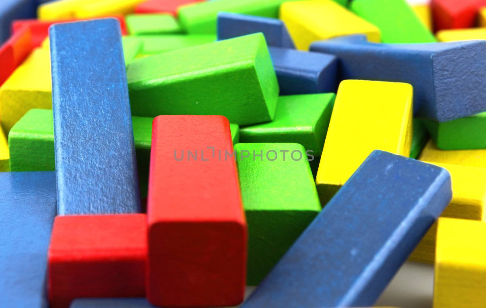 Wooden building blocks isolated on white background