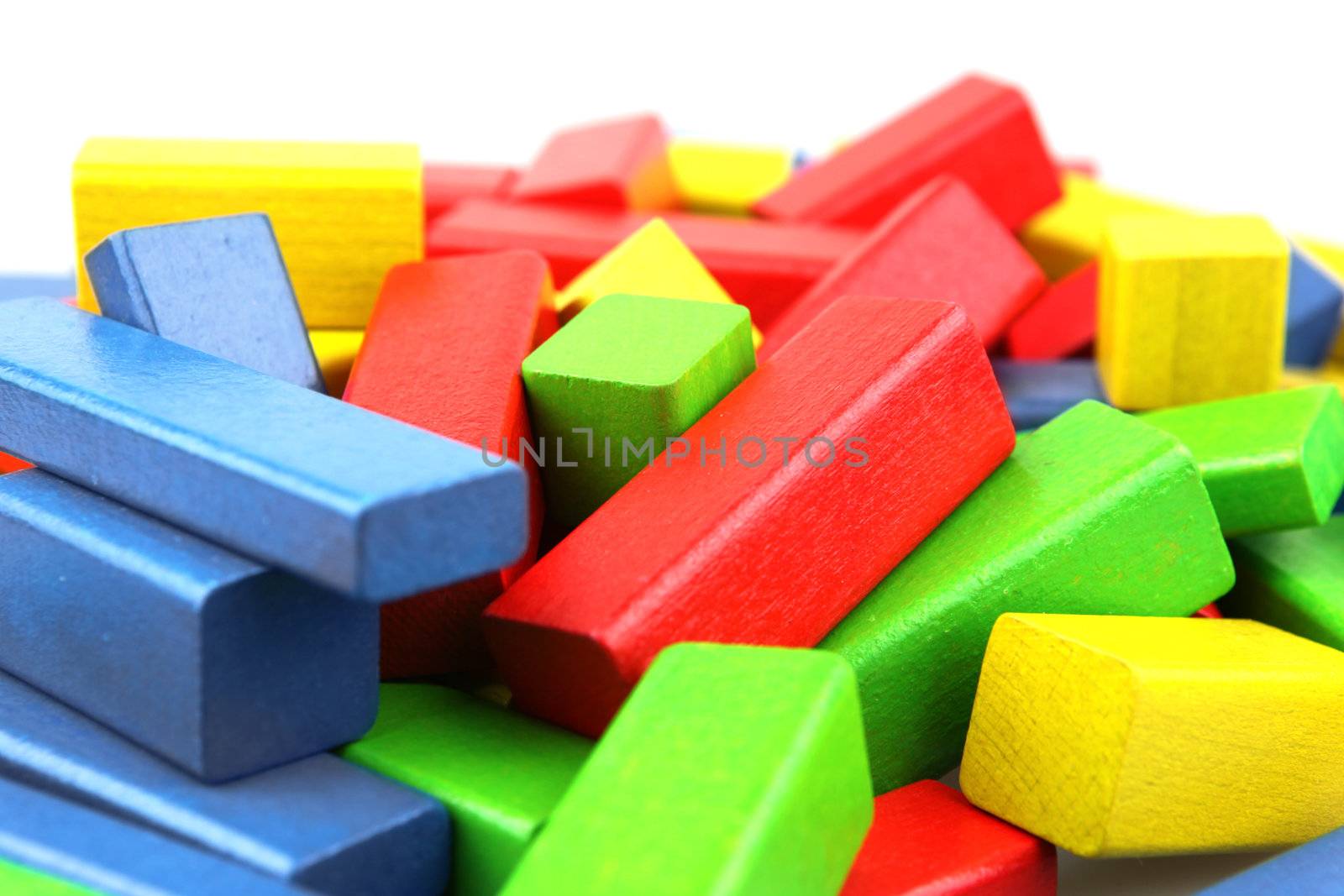 Wooden building blocks isolated on white background