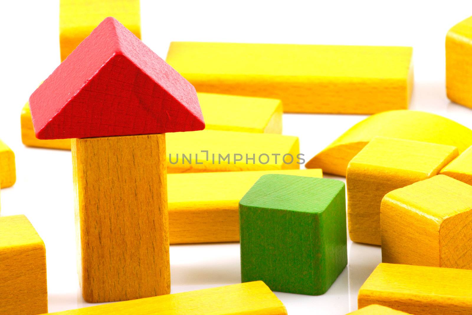 Wooden building blocks isolated on white background