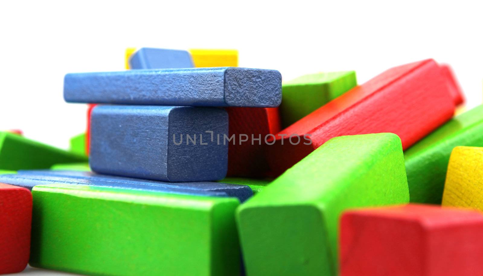 Wooden building blocks isolated on white background