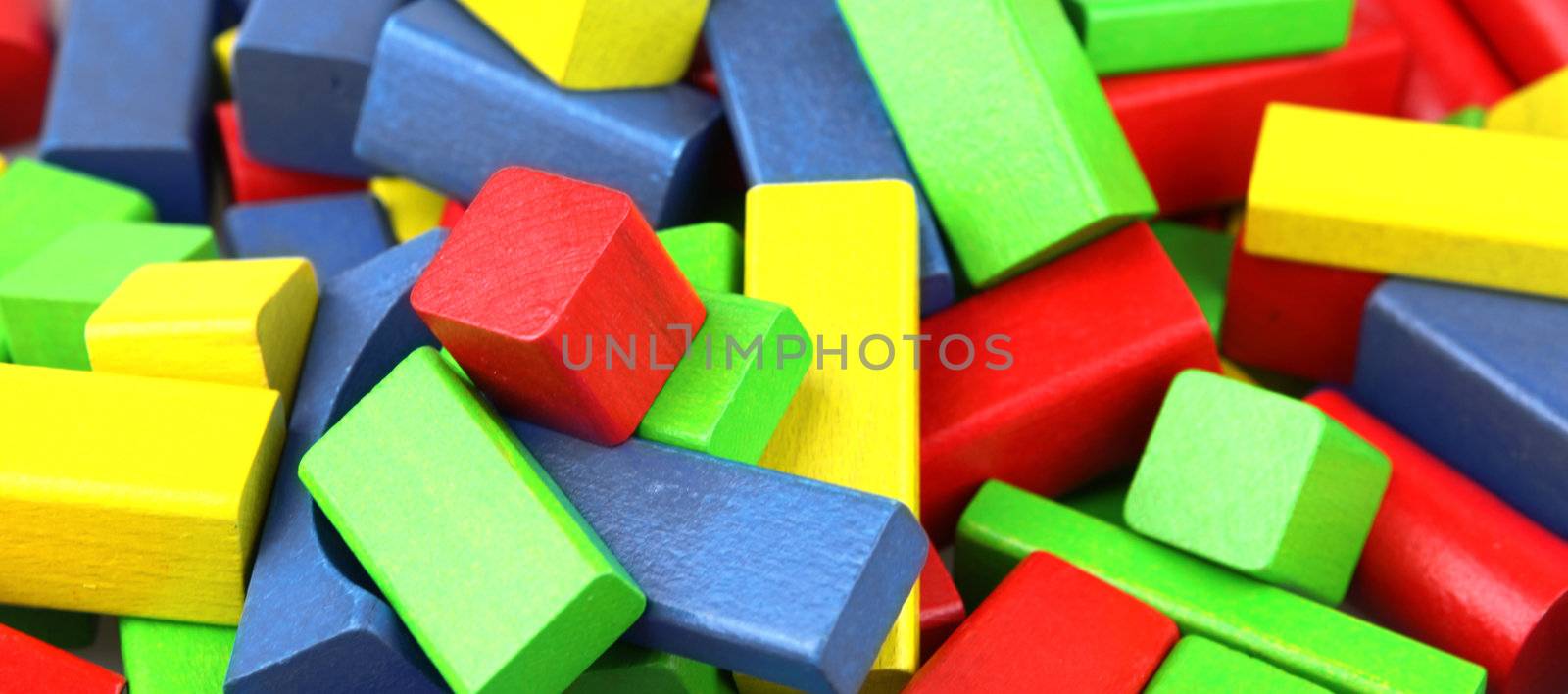 Wooden building blocks isolated on white background