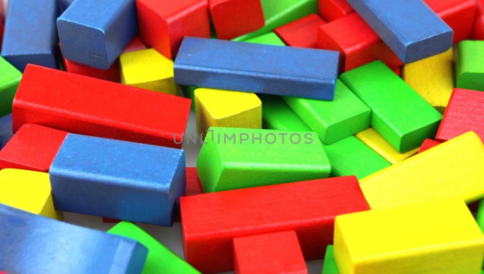 Wooden building blocks isolated on white background