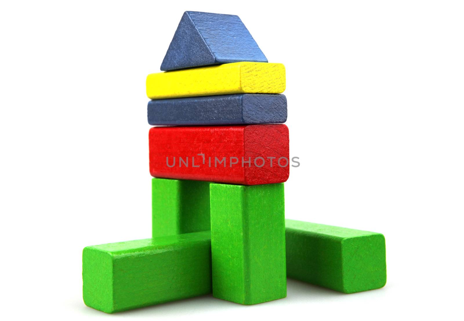 Wooden building blocks isolated on white background